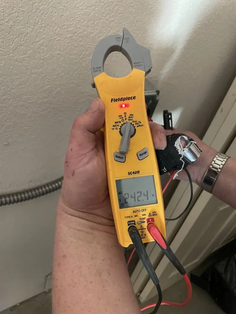 Voltage testing with clamp meter during Generator Installation in West Bountiful